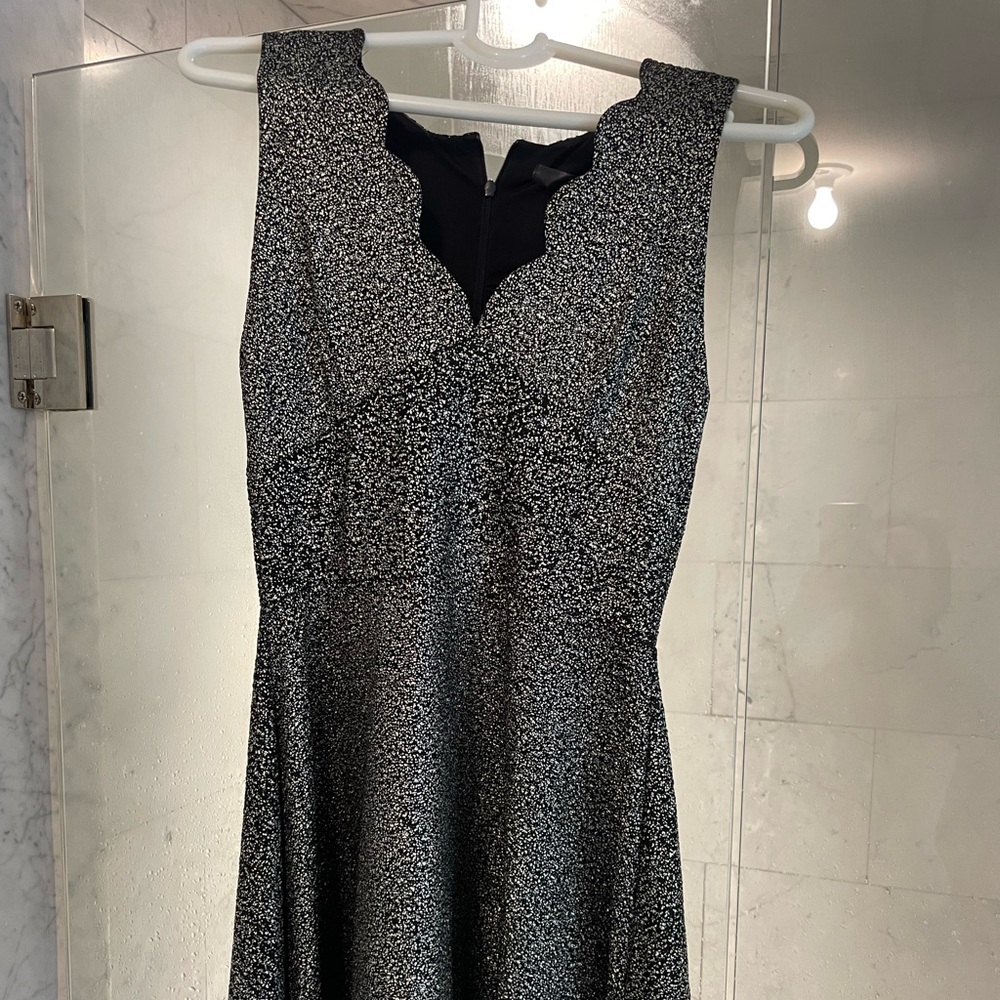 New with tags- Aqua semi formal dress in silver/black metallic.
